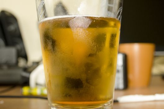 Detail of fresh beer with drops for background
