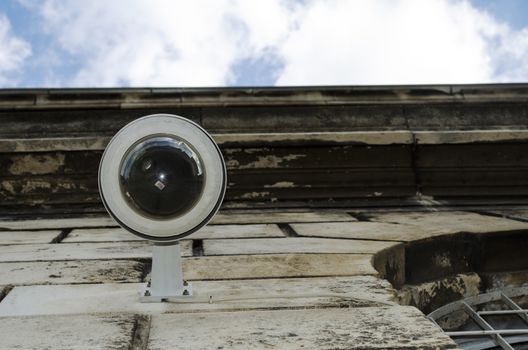 Hi-tech dome type camera and a blue sky