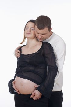 expecting couple - man touching his pregnant wife�s belly