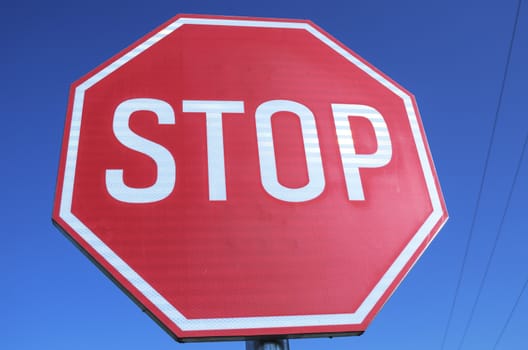 Stop sign in country road