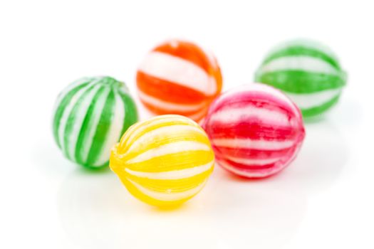 colored candies isolated on white.