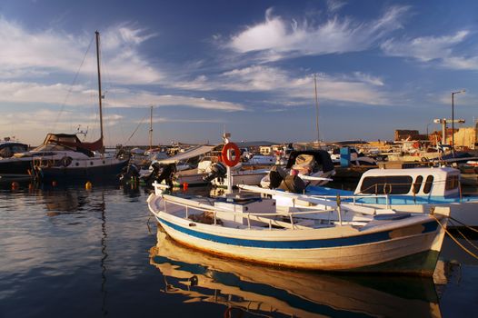 Ships and boats in the old harbor of Chania, Greece