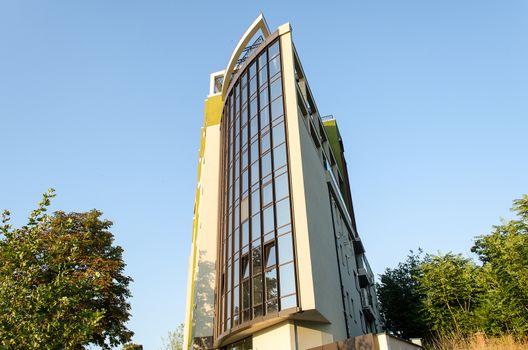 Exterior of glass residential building sunrise view