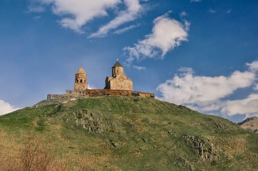 Panoramic view of an old church standing on a hill in Georgia