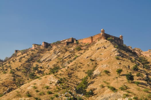 Panoramic view of Amer Palace standing on a hilltop in Rajasthan, India