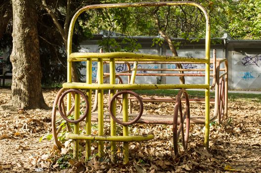 Playground yellow truck retro spring close up