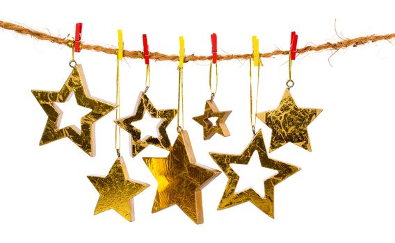 Golden Christmas stars, isolated over white background