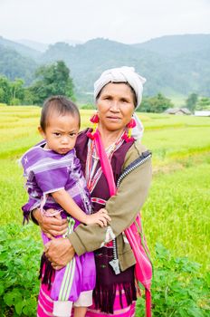 CHIANG MAI -THAILAND OCTOBER 18: Unidentified Pa-Ka-Geh-Yor (Karen Sgaw) and children 2-6 year old in Tribal dress for photograph at Doi Inthanon on October 18, 2014 in Chiang Mai,Thailand. Pa-Ka-Geh-Yor are an ethnic group spread north of Thailand.