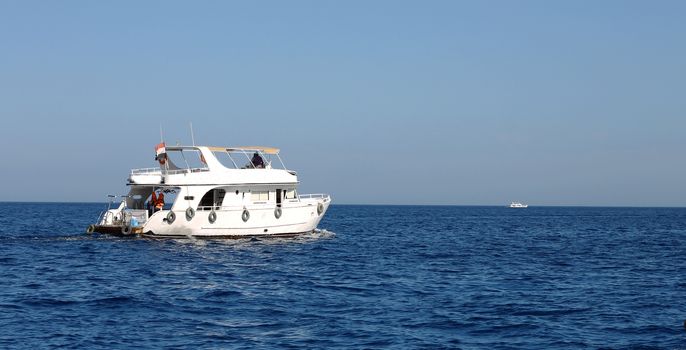 White Ship Moving By The Red Sea