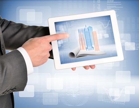 Man hands using tablet pc. Image of wire-frame buildings and open book on tablet screen