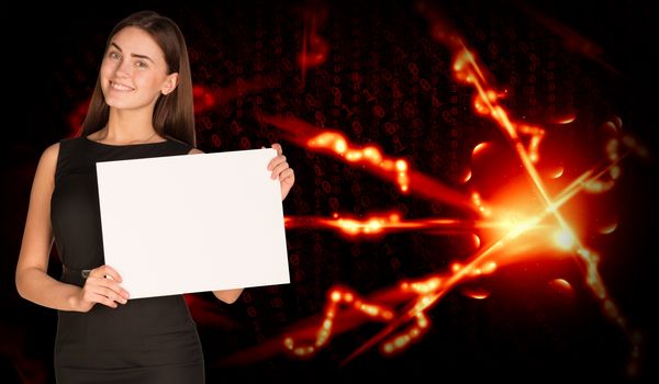 Businesswoman holding empty paper. Red glowing figures as backdrop
