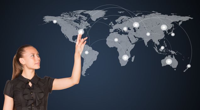 Businesswoman point finger at world map. Connection concept