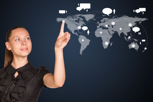 Businesswoman point finger at world map. Connection concept