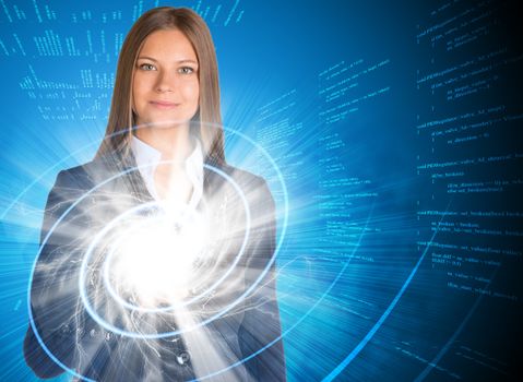 Businesswoman pointing her finger on glowing spiral. Text rows as backdrop