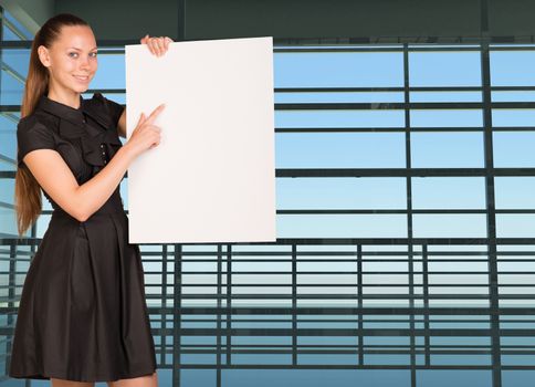 Businesswoman holding empty paper. Large window in office building as background