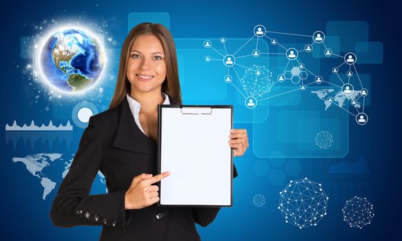 Beautiful businesswoman in suit holding paper holder. Earth and graphs in background. Elements of this image furnished by NASA