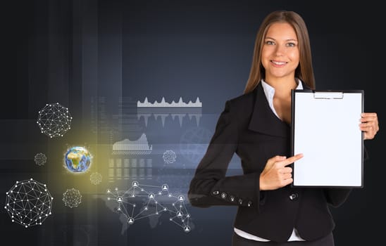 Beautiful businesswoman in suit holding paper holder. Earth, network and graphs in background. Elements of this image furnished by NASA