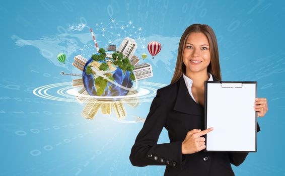 Beautiful businesswoman in suit holding paper holder. Earth with buildings and figures in background. Elements of this image furnished by NASA