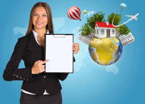 Beautiful businesswoman in suit holding paper holder. Earth with buildings and trees in background. Elements of this image furnished by NASA