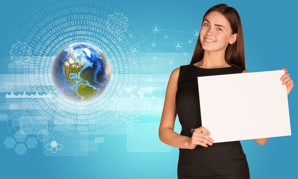Beautiful businesswoman in dress holding paper holder. Earth with figures and graphs in background. Elements of this image furnished by NASA