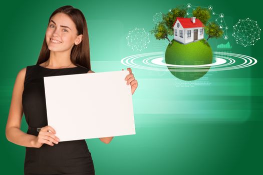 Beautiful businesswoman in dress holding paper holder. Earth with house and trees in background