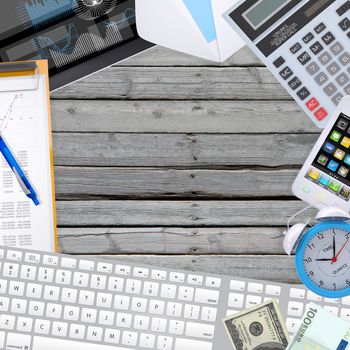 Office objects, tablet pc and keyboard lying on old wooden boards. Business concept