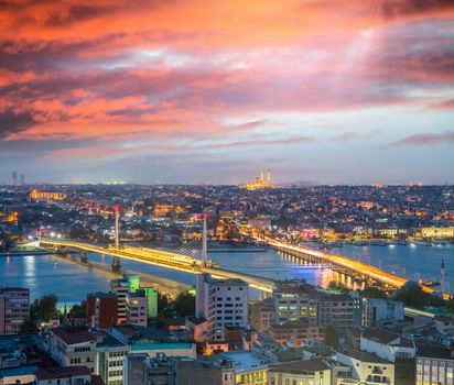 Istanbul night panoramic view and Golden Horn river from Beyoglu.