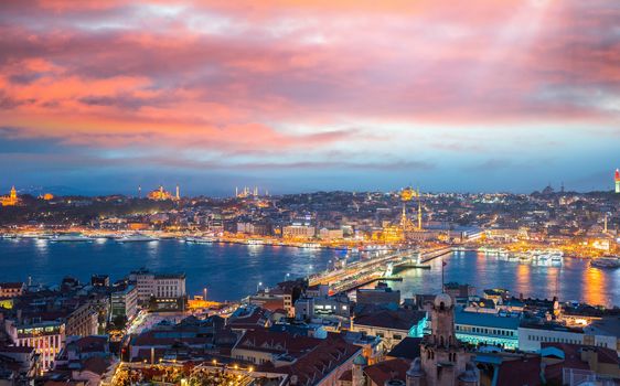 Istanbul night panoramic view and Golden Horn river from Beyoglu.