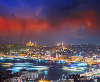 Instanbul night lights with Hagia Sophia and Blue Mosque in background.