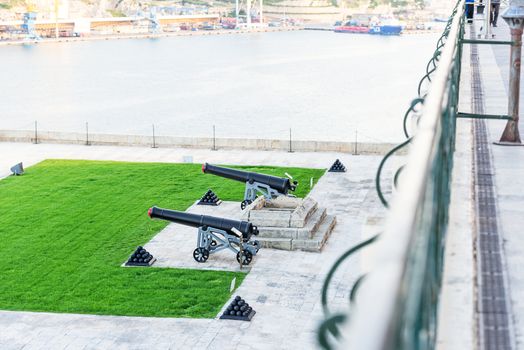 The old gun in La Valletta and Fort St. Angelo of La Vittoriosa in Malta