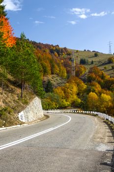 Beautiful curvy road in autumn, Moldavia.