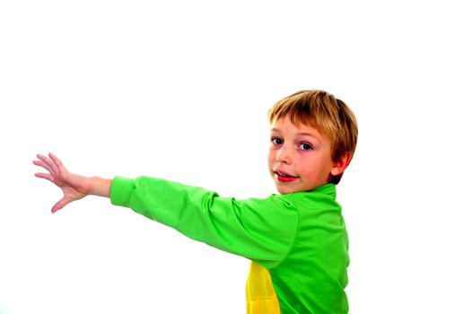 A young boy in studio in green cardigan on white background