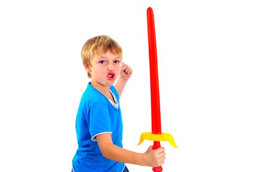 A young boy playing with sword on a white background