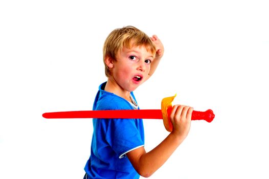 A young boy playing with sword on a white background