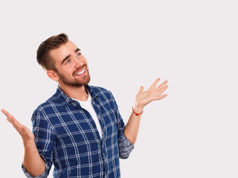 Emotions, feelings. Young guy with on a white background