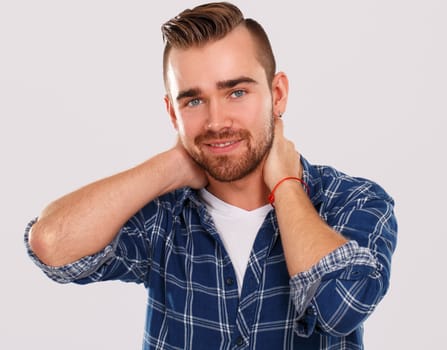 Emotions, feelings. Young guy with on a white background