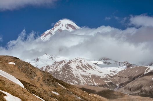 Clouds passing over the picturesque slopes of Georgian mountains 