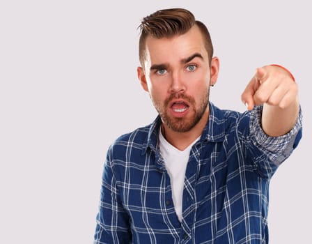 Emotions, feelings. Young guy with on a white background