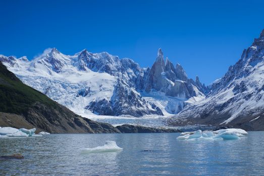 Panoramic view of a lake at the foot of snowy mountains in Los Glaciares National Park                        