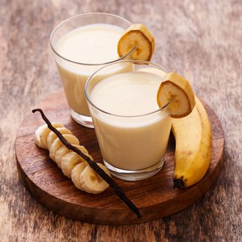 Yummy banana milkshake on a table