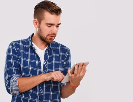 Emotions, feelings. Young guy with on a white background