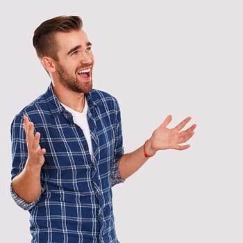 Emotions, feelings. Young guy with on a white background