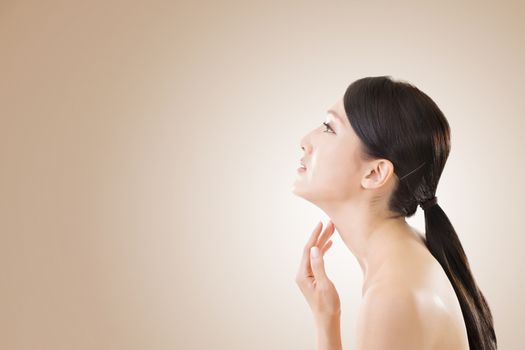 Asian beauty face closeup portrait with clean and fresh elegant lady. Side view.