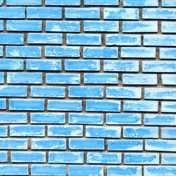 Blue brick wall texture background .