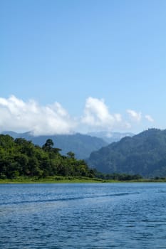 Lake mountain with clouds and blue sky