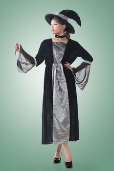 Asian witch hold something, full length portrait isolated.