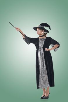 Asian witch hold something, full length portrait isolated.