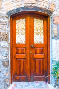 stone walls and a door in the medieval style