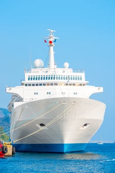 white liner moored to the pier