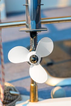 white screw boat is photographed close-up